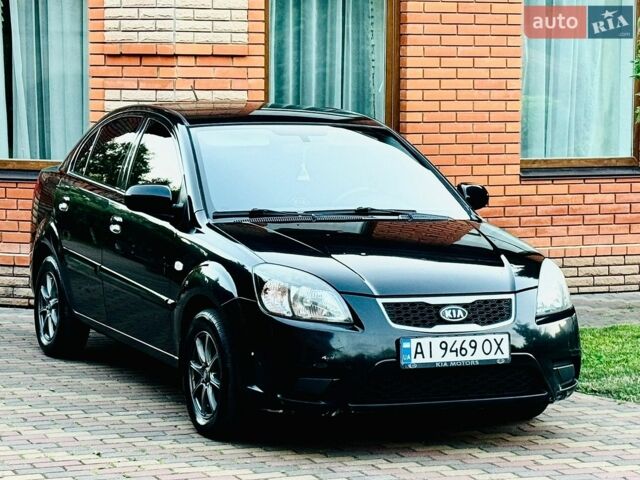 Черный Киа Рио, объемом двигателя 1.49 л и пробегом 230 тыс. км за 4600 $, фото 1 на Automoto.ua