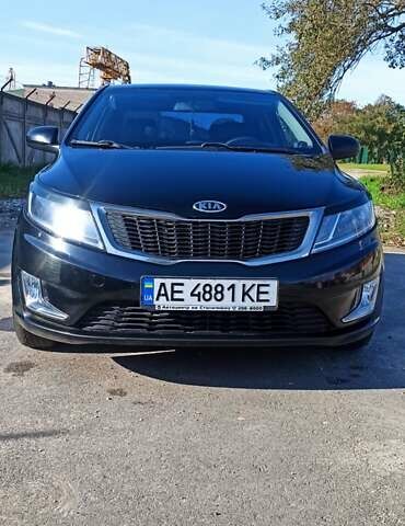 Чорний Кіа Ріо, об'ємом двигуна 1.4 л та пробігом 160 тис. км за 7700 $, фото 1 на Automoto.ua