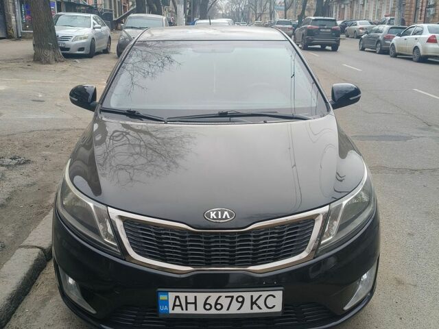 Черный Киа Рио, объемом двигателя 1.3 л и пробегом 120 тыс. км за 6850 $, фото 1 на Automoto.ua