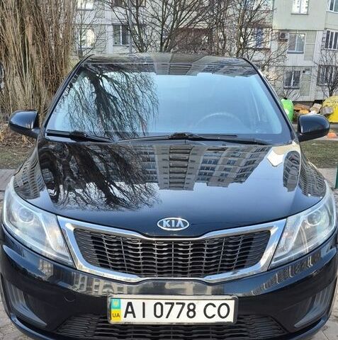Черный Киа Рио, объемом двигателя 1.4 л и пробегом 362 тыс. км за 5500 $, фото 1 на Automoto.ua
