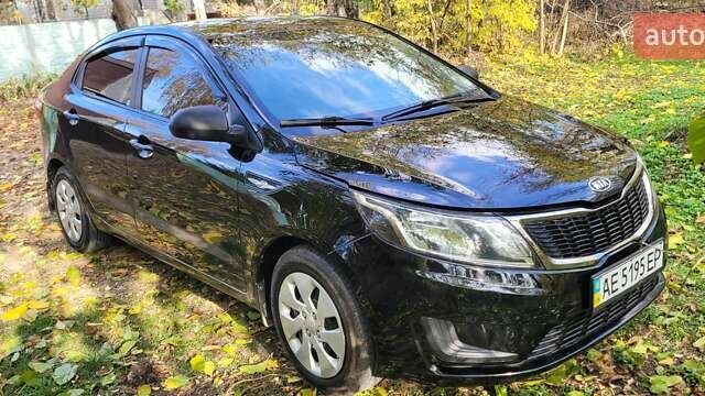 Черный Киа Рио, объемом двигателя 1.4 л и пробегом 120 тыс. км за 7200 $, фото 1 на Automoto.ua