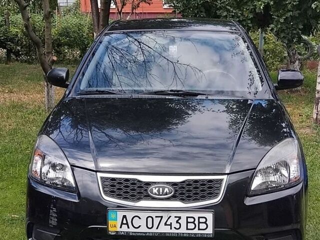 Чорний Кіа Ріо, об'ємом двигуна 1.4 л та пробігом 115 тис. км за 5600 $, фото 1 на Automoto.ua