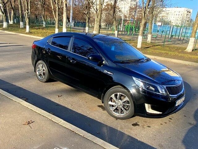 Черный Киа Рио, объемом двигателя 1.4 л и пробегом 135 тыс. км за 7100 $, фото 1 на Automoto.ua