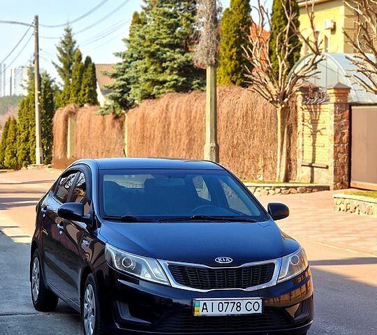 Чорний Кіа Ріо, об'ємом двигуна 1.4 л та пробігом 180 тис. км за 6500 $, фото 1 на Automoto.ua