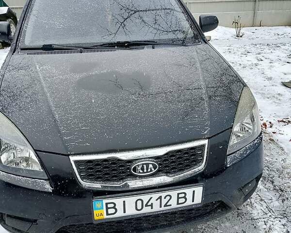 Чорний Кіа Ріо, об'ємом двигуна 1.4 л та пробігом 100 тис. км за 5800 $, фото 1 на Automoto.ua