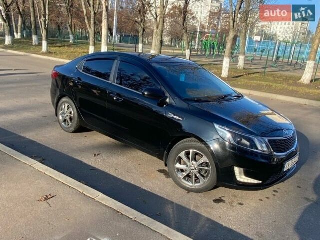 Чорний Кіа Ріо, об'ємом двигуна 1.4 л та пробігом 135 тис. км за 7100 $, фото 1 на Automoto.ua