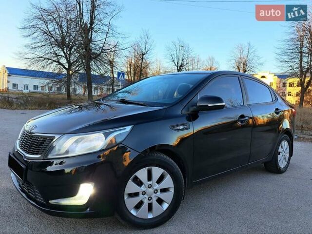 Черный Киа Рио, объемом двигателя 1.59 л и пробегом 231 тыс. км за 7600 $, фото 1 на Automoto.ua
