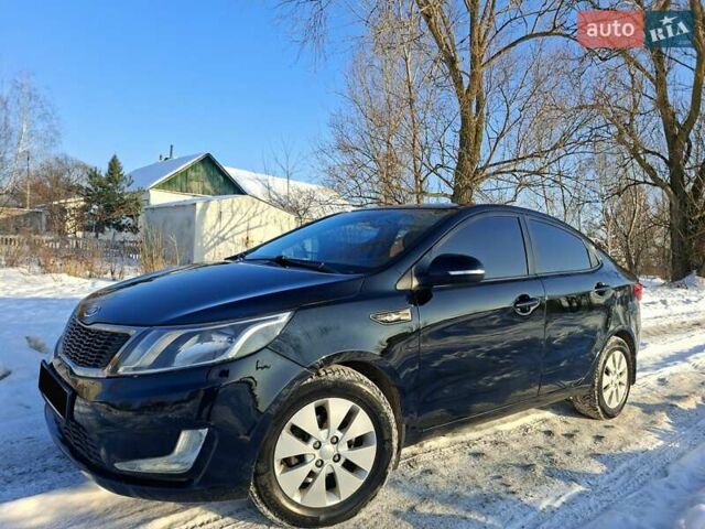 Черный Киа Рио, объемом двигателя 1.59 л и пробегом 231 тыс. км за 7100 $, фото 1 на Automoto.ua