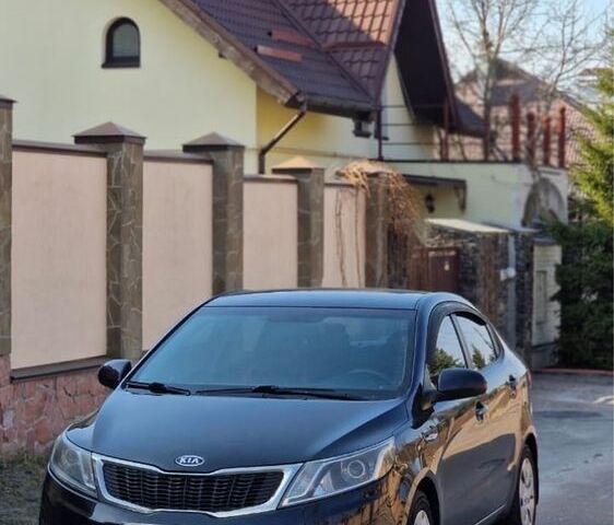 Черный Киа Рио, объемом двигателя 1.4 л и пробегом 180 тыс. км за 6500 $, фото 1 на Automoto.ua