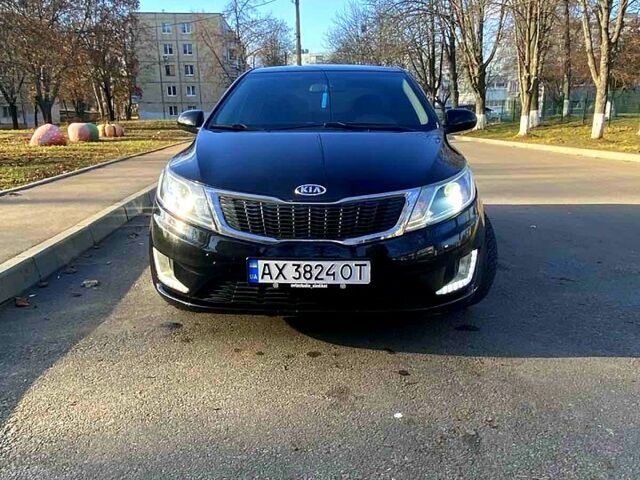 Чорний Кіа Ріо, об'ємом двигуна 1.4 л та пробігом 1350 тис. км за 7100 $, фото 1 на Automoto.ua