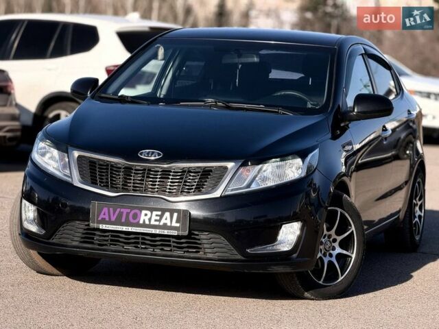 Черный Киа Рио, объемом двигателя 1.4 л и пробегом 162 тыс. км за 7700 $, фото 1 на Automoto.ua
