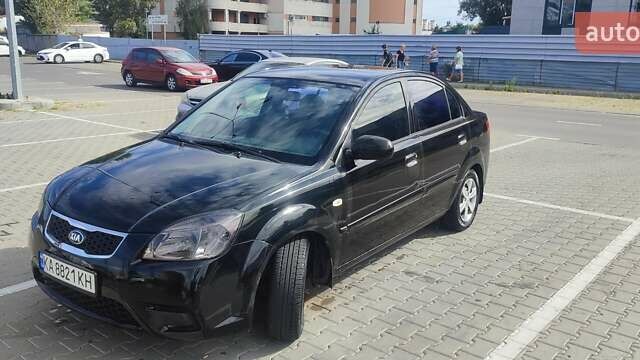 Черный Киа Рио, объемом двигателя 1.4 л и пробегом 224 тыс. км за 4600 $, фото 1 на Automoto.ua