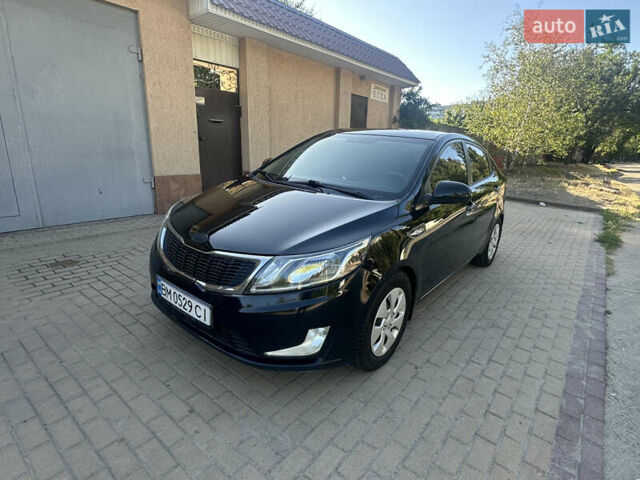 Черный Киа Рио, объемом двигателя 1.4 л и пробегом 182 тыс. км за 5800 $, фото 1 на Automoto.ua