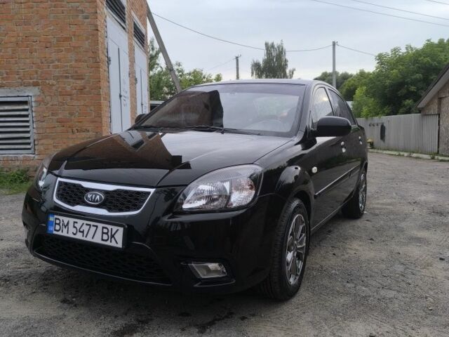 Черный Киа Рио, объемом двигателя 1.4 л и пробегом 137 тыс. км за 6300 $, фото 1 на Automoto.ua