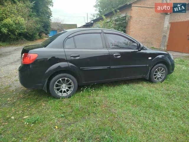 Черный Киа Рио, объемом двигателя 1.4 л и пробегом 133 тыс. км за 5900 $, фото 1 на Automoto.ua