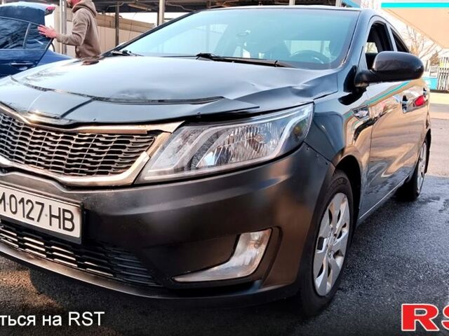 Чорний Кіа Ріо, об'ємом двигуна 1.6 л та пробігом 173 тис. км за 5800 $, фото 1 на Automoto.ua