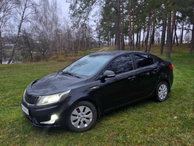 Черный Киа Рио, объемом двигателя 1.6 л и пробегом 231 тыс. км за 5850 $, фото 1 на Automoto.ua