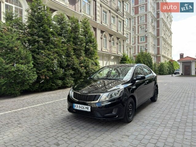 Чорний Кіа Ріо, об'ємом двигуна 1.4 л та пробігом 63 тис. км за 7600 $, фото 1 на Automoto.ua