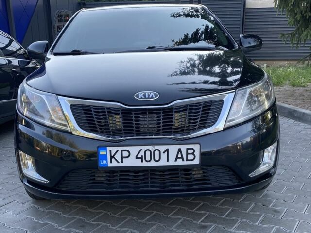 Черный Киа Рио, объемом двигателя 1.6 л и пробегом 330 тыс. км за 6300 $, фото 1 на Automoto.ua