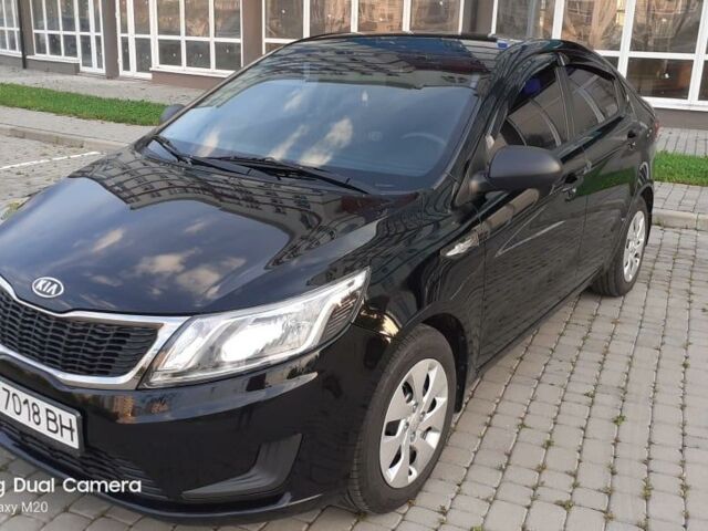 Чорний Кіа Ріо, об'ємом двигуна 1.4 л та пробігом 80 тис. км за 8700 $, фото 1 на Automoto.ua