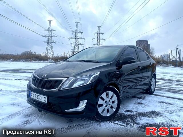 Черный Киа Рио, объемом двигателя 1.6 л и пробегом 25000 тыс. км за 6900 $, фото 1 на Automoto.ua