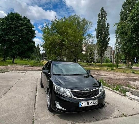Чорний Кіа Ріо, об'ємом двигуна 1.4 л та пробігом 199 тис. км за 8800 $, фото 1 на Automoto.ua