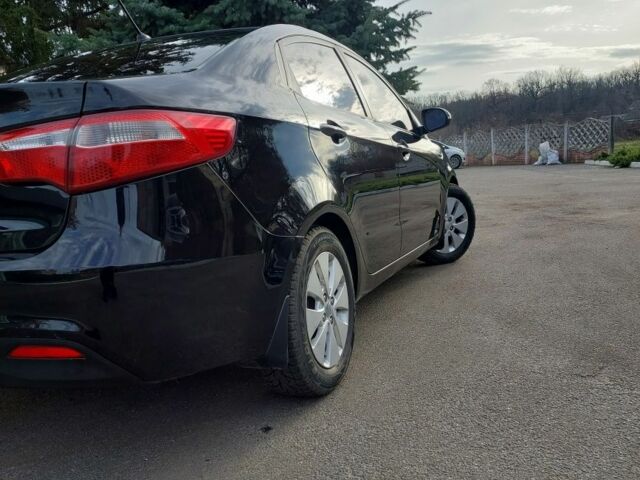 Чорний Кіа Ріо, об'ємом двигуна 0 л та пробігом 246 тис. км за 6800 $, фото 1 на Automoto.ua