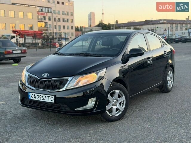 Черный Киа Рио, объемом двигателя 1.4 л и пробегом 201 тыс. км за 6900 $, фото 1 на Automoto.ua