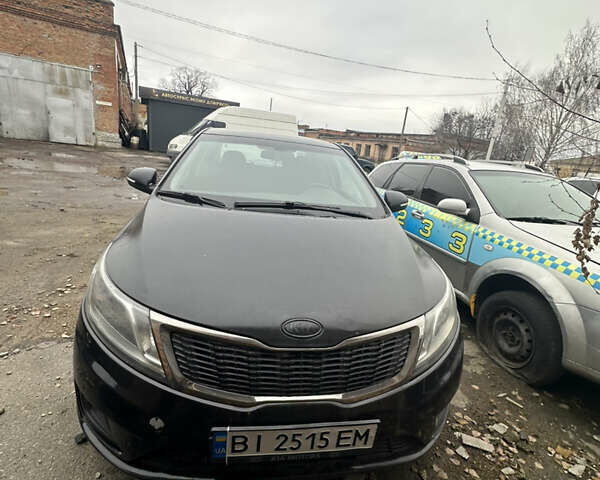 Чорний Кіа Ріо, об'ємом двигуна 1.4 л та пробігом 100 тис. км за 3500 $, фото 1 на Automoto.ua