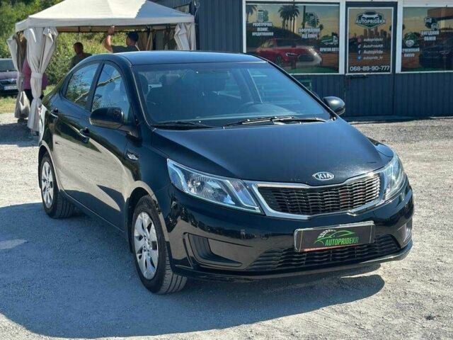 Чорний Кіа Ріо, об'ємом двигуна 1.4 л та пробігом 53 тис. км за 8933 $, фото 1 на Automoto.ua