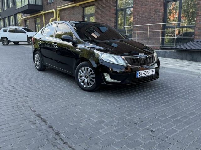 Черный Киа Рио, объемом двигателя 1.4 л и пробегом 103 тыс. км за 7800 $, фото 1 на Automoto.ua