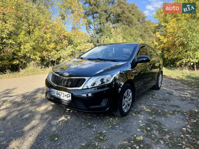 Черный Киа Рио, объемом двигателя 1.4 л и пробегом 173 тыс. км за 7300 $, фото 1 на Automoto.ua