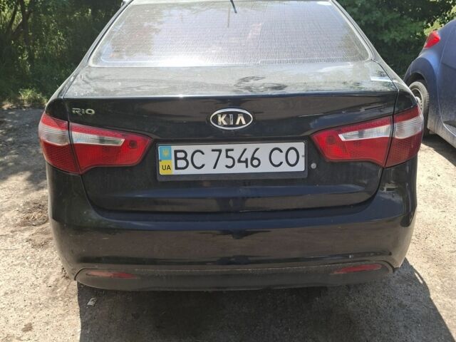 Черный Киа Рио, объемом двигателя 1.4 л и пробегом 255 тыс. км за 2694 $, фото 1 на Automoto.ua