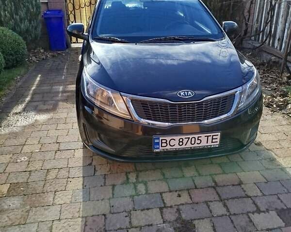 Чорний Кіа Ріо, об'ємом двигуна 1.4 л та пробігом 95 тис. км за 7000 $, фото 1 на Automoto.ua