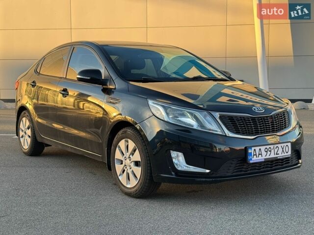 Черный Киа Рио, объемом двигателя 1.6 л и пробегом 181 тыс. км за 7950 $, фото 1 на Automoto.ua