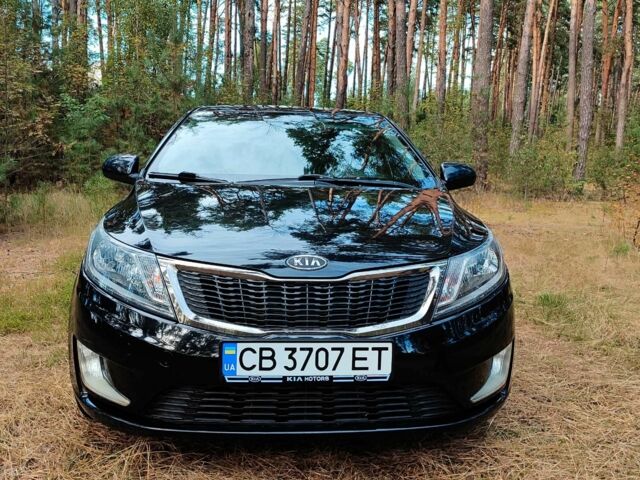 Чорний Кіа Ріо, об'ємом двигуна 0 л та пробігом 125 тис. км за 7099 $, фото 1 на Automoto.ua