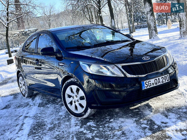 Чорний Кіа Ріо, об'ємом двигуна 1.4 л та пробігом 245 тис. км за 7600 $, фото 1 на Automoto.ua