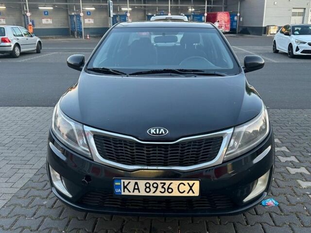Чорний Кіа Ріо, об'ємом двигуна 1.4 л та пробігом 190 тис. км за 7100 $, фото 1 на Automoto.ua