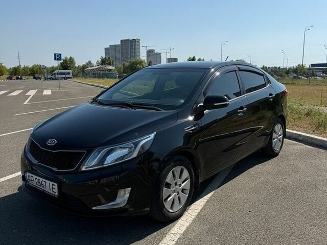 Чорний Кіа Ріо, об'ємом двигуна 1.59 л та пробігом 230 тис. км за 7000 $, фото 1 на Automoto.ua
