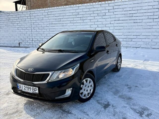 Чорний Кіа Ріо, об'ємом двигуна 1.6 л та пробігом 270 тис. км за 6499 $, фото 1 на Automoto.ua