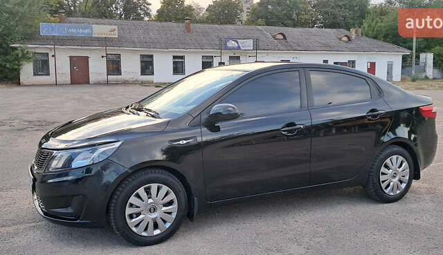 Черный Киа Рио, объемом двигателя 1.4 л и пробегом 89 тыс. км за 6800 $, фото 1 на Automoto.ua