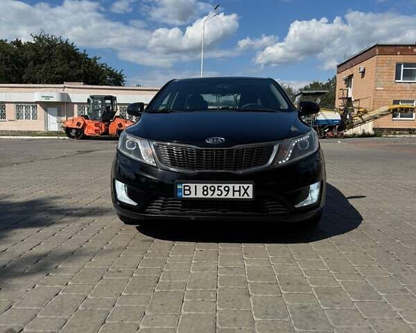 Чорний Кіа Ріо, об'ємом двигуна 1.4 л та пробігом 158 тис. км за 8300 $, фото 1 на Automoto.ua