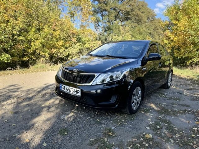 Чорний Кіа Ріо, об'ємом двигуна 1.4 л та пробігом 173 тис. км за 7300 $, фото 1 на Automoto.ua