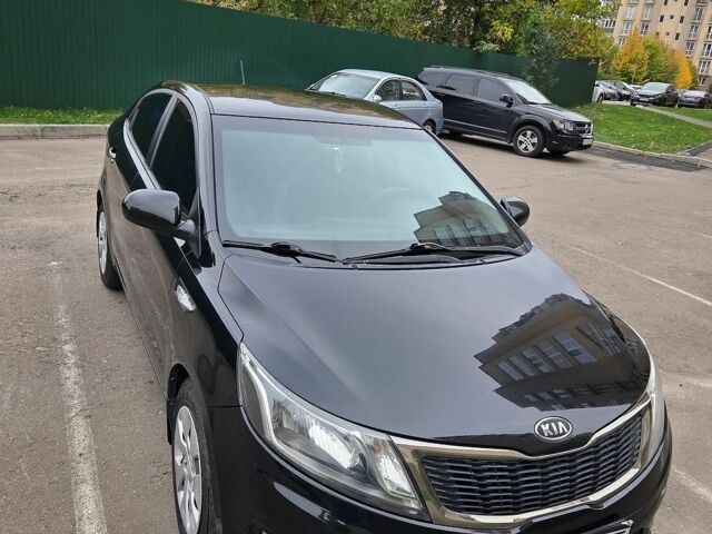 Чорний Кіа Ріо, об'ємом двигуна 1.6 л та пробігом 215 тис. км за 7500 $, фото 1 на Automoto.ua
