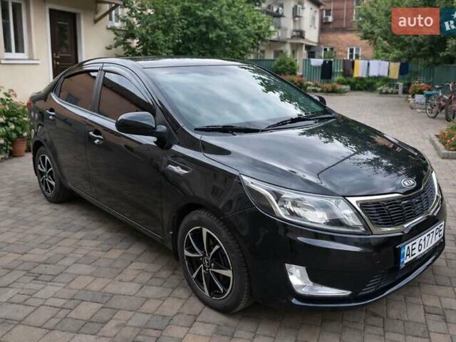Чорний Кіа Ріо, об'ємом двигуна 1.59 л та пробігом 144 тис. км за 8700 $, фото 1 на Automoto.ua