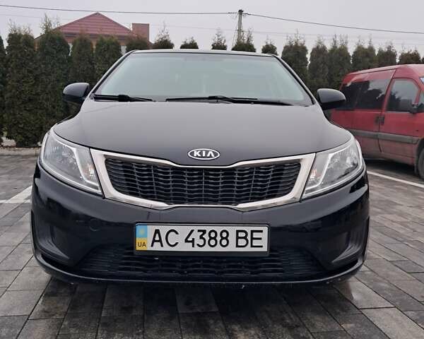 Черный Киа Рио, объемом двигателя 1.4 л и пробегом 244 тыс. км за 6900 $, фото 1 на Automoto.ua