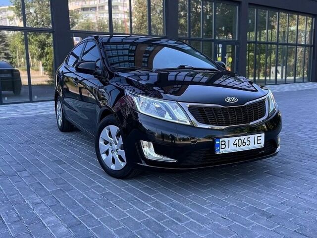 Черный Киа Рио, объемом двигателя 1.4 л и пробегом 103 тыс. км за 7800 $, фото 1 на Automoto.ua