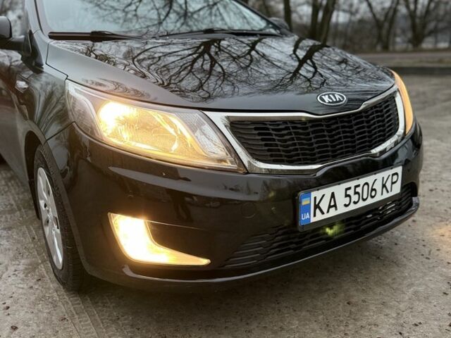 Черный Киа Рио, объемом двигателя 1.6 л и пробегом 210 тыс. км за 8000 $, фото 1 на Automoto.ua