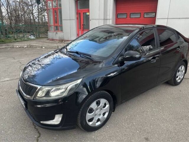 Чорний Кіа Ріо, об'ємом двигуна 1.6 л та пробігом 273 тис. км за 6200 $, фото 1 на Automoto.ua