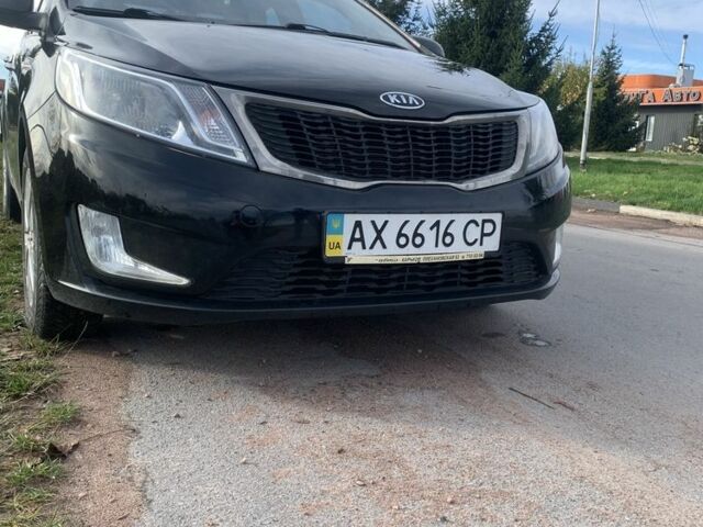 Чорний Кіа Ріо, об'ємом двигуна 1.4 л та пробігом 190 тис. км за 5500 $, фото 1 на Automoto.ua